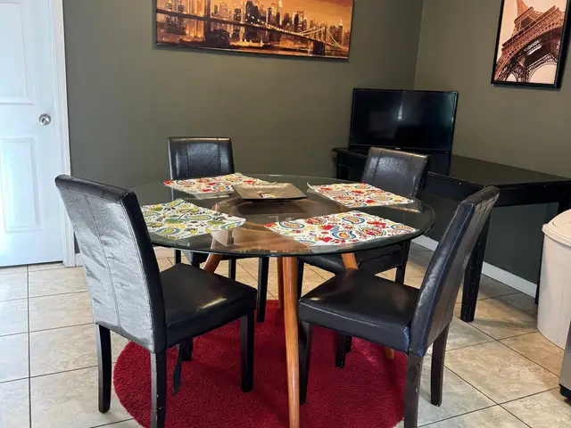 Bliss 2 dining table on a red rug