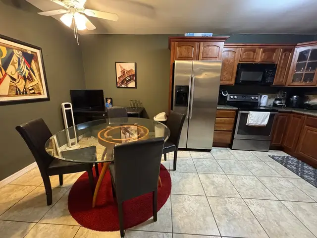 Bliss 2 dining area with view into the kitchen