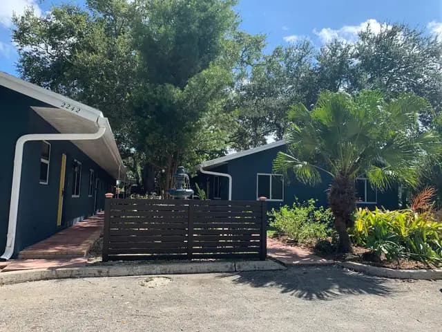 Gated property with tropical landscaping
