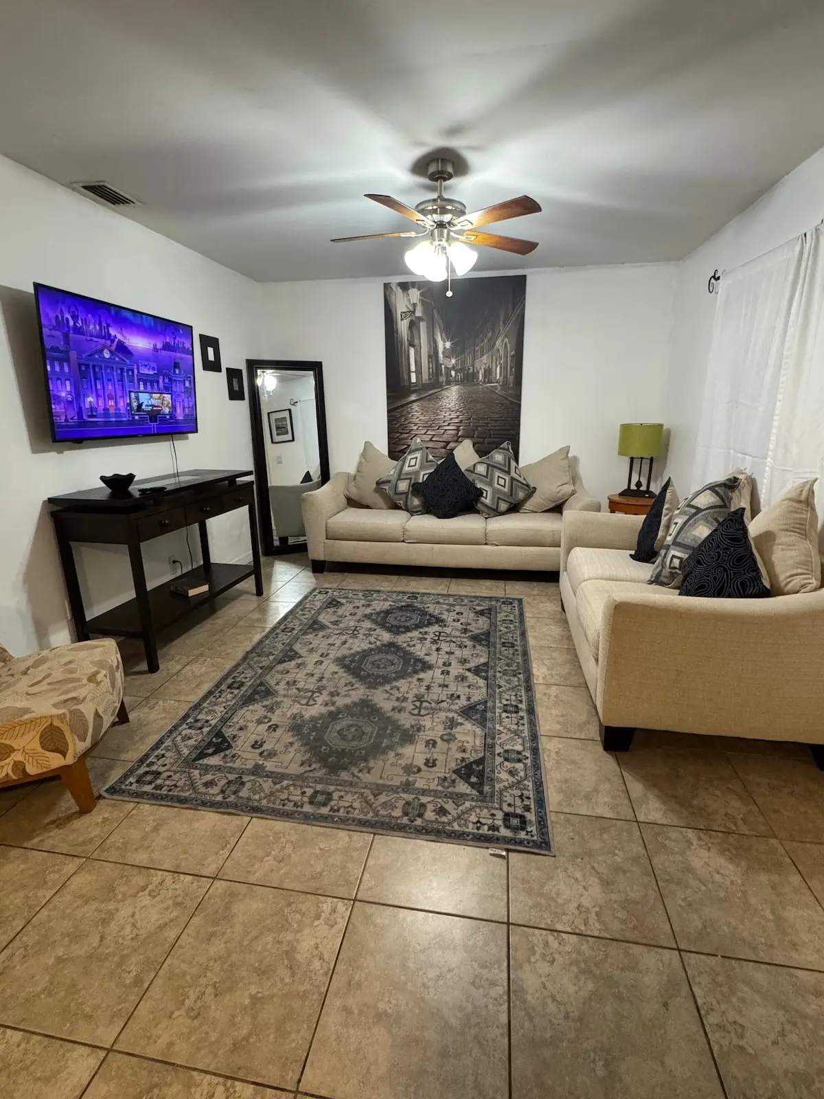 Bright furnished living room in a Kaizen Rentals suite, Hollywood, FL